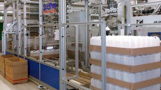 Packanlage S-Pack-Pal-T von Steffes zum Sammeln, Packen und Palettieren von Hohlkörpern verschiedenster Art, realisiert aus Aluminiumprofilen und Fördertechnik von MK. (Maschinenbau Kitz)