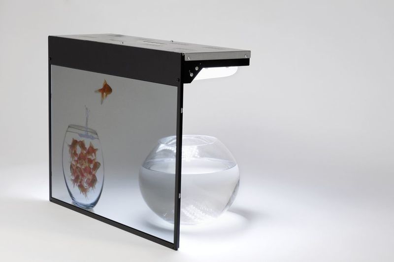 Le même écran de profil, où l'on devine la partie virtuel, les poissons de la partie réelle, soit l'aquarium vide. (Image: www.movebox.com) (Archiv: Vogel Business Media)