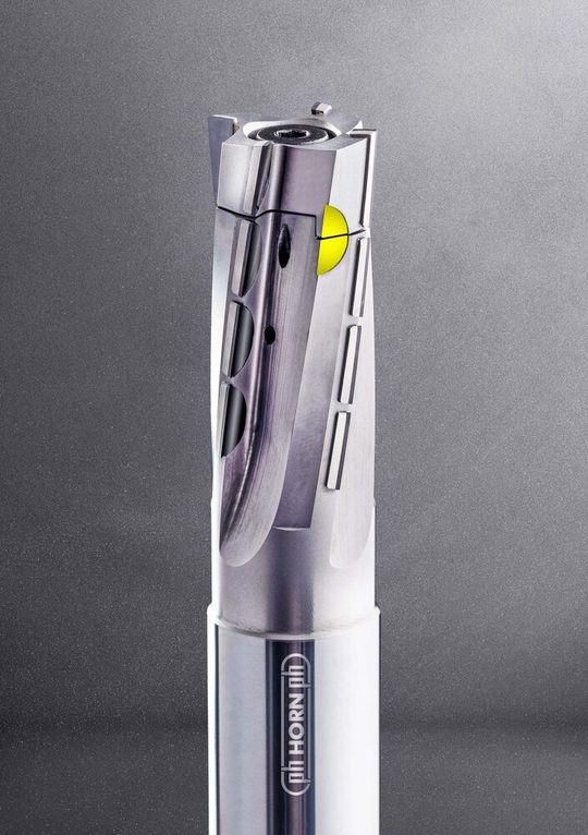 Horn’s new DM40 series end mills comprise a solid carbide toolholder and an interchangeable steel head with brazed-on PCD cutting tips.(Source:  Horn)