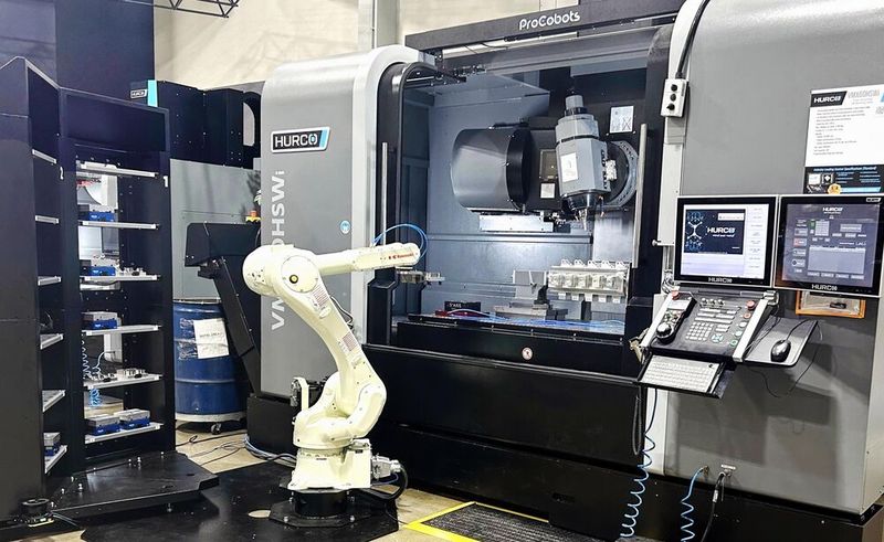 A Hurco / Kawasaki automated machining cell based on a 5-axis, swivelling-spindle Hurco machine. At Mach 2026, the robot system will feed a cantilever-type 5-axis model, VC500i. (Source: Hurco Europe )