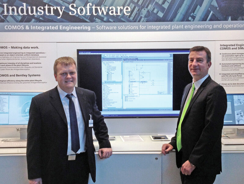 Andreas Geiss, Vice President Comos Industry Solutions, and Carsten Gerke, Vice President Professional Services Bentley, at the Siemens stand at Hannover Messe. (Pictue: Kielburger)