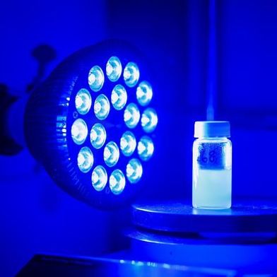 A University at Buffalo study used visible light to help build more complex drug molecules in a fewer steps. The method involves blue LED lights activating a catalyst inside solution.  (Source: Meredith Forrest Kulwicki/ University at Buffalo)