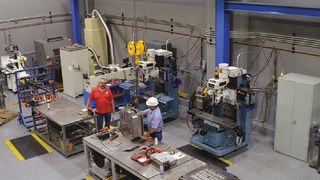 In addition to a 10-ton overhead crane, Henkel Richmond’s toolroom is outfitted with grinders, mills, lathes, EDMs, drill presses and a laser welder. (Henkel)