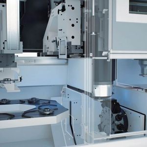 Während in der einen Spindel ein Werkstück bearbeitet wird, kann die andere Spindel das fertig bearbeitete Werkstück ablegen und ein unbearbeitetes neu aufnehmen. Bild: Emag