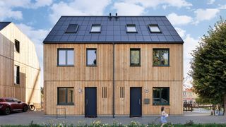 Eines der fertigen Gebäude von Kokoni One. (Bild: Swiss Krono, Foto: Paul Gerdes)