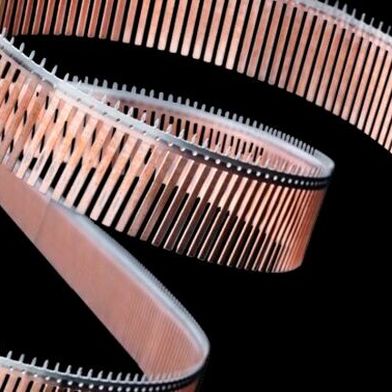 HYBRO+ in its final configuration as a bronze-iron composite strip for connector applications in combination with a press-fit zone (Source: Voestalpine Precision Strip)