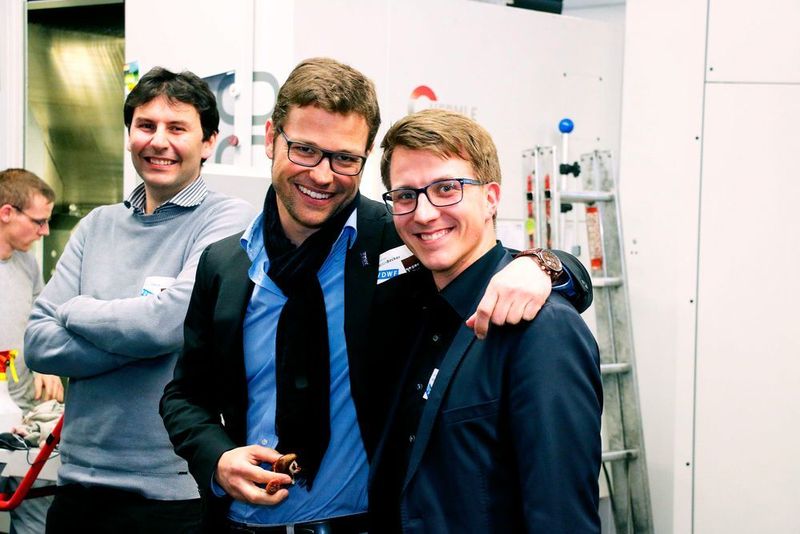 Host Henning Köllner (right) and Martin Becker, MD Dast GmbH (middle). (Source: wortundform)