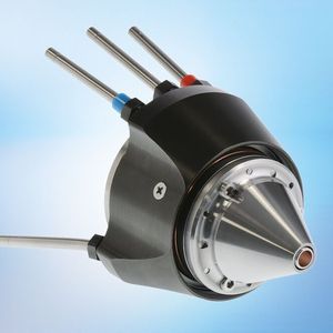 Und hier sitzt das Düsenspitzenmodul auf dem Düsengrundkörper. Pulverwirkungsgrade von bis zu 95 % können beim Laserauftragschweißen erreicht werden - sehr materialeffizient!(Bild:  Fraunhofer-ILT)