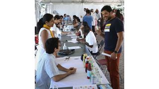 Senior study author Dr. Namratha Kandula (left) sharing information on salt and diet during a community medicine event.  (Source: Northwestern University)