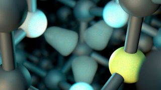 Im nahezu perfekten Gitter gibt es Stellen an denen ein Kohlenstoffatom zwischen den benachbarten Atomen (weiß) fehlt und daneben ein Stickstoffatom (gelb) eingebaut ist. (Bild: TU Wien)