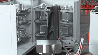 Der Turm im Inneren der Zelle kann Dreh-, Hub- und Fahrbewegungen ausführen. Er beschickt so Rüstplatz, Speichermodule und Arbeitsraum mit den Werkstücken.  (Bild: Hermle AG, STÖBER Antriebstechnik GmbH + Co. KG)