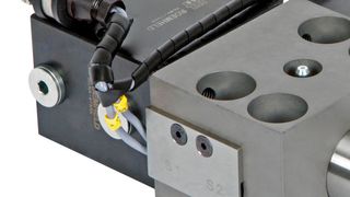 Roemheld has developed a wedge clamp specifically for the fixing of upper dies which meets the highest of safety requirements. An additional locking cylinder with bolt holds the wedge clamp in position and prevents any inadvertent retraction. (Roemheld)