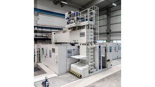 Dreh- und Fräsmaschine mit einem verfahrbaren Portal für die Vertikalbearbeitung sowie begehbare X-Achsen (Gretel Anne Baumgarten)