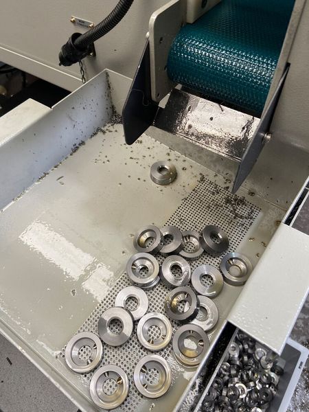 Components captured in the Hanwha XD38II after machining. (Source: Dugard)