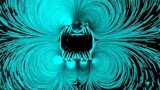 Ein einer Seesternlarve nachempfundener Mikroroboter wirbelt Plastikkügelchen umher.  (Cornel Dillinger/ETH Zürich)