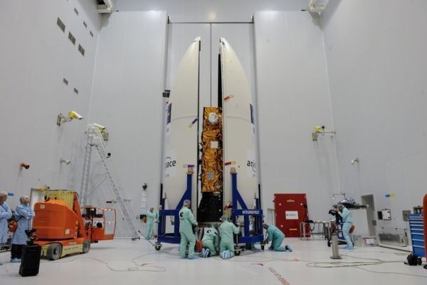 Sentinel-2A being encapsulated within the half-shells of the Vega rocket fairing. (Image source: ESA)