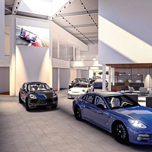 Das neue Porsche-Zentrum Niederbayern ist der weltweit dritte Standort, der nach dem Architekturstandard Destination Porsche komplett neu errichtet wird. Bis Ende 2022 sollen die Arbeiten beendet sein.(Bild:  Grafik: Thomas Gollner)