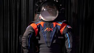 The prototype of the Artemis III spacesuit, the AxEMU. Although this prototype uses a dark gray cover material, the final version will probably be all white when worn by NASA astronauts on the lunar surface. (Image:Axiom Space)