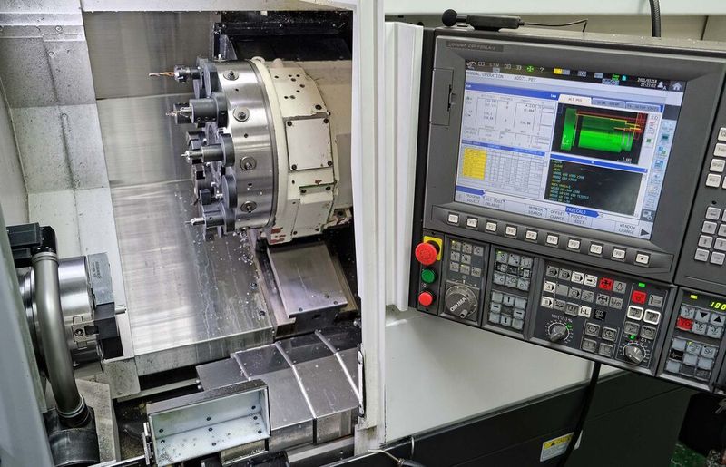 Two views of the Okuma Genos L3000M turn-mill centre at EV Engineering. (NCMT)