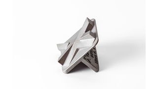 A common misconception is that 3D printing only produces weak parts. This component was made from titanium using Direct Metal Laser Sintering. (Image:Xometry/Bastian Fischer)