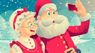 Mit einer Selfie-Stange würden die Fotos vom Weihnachtsmann sicher noch besser gelingen. (nicoletaionescu - Fotolia)