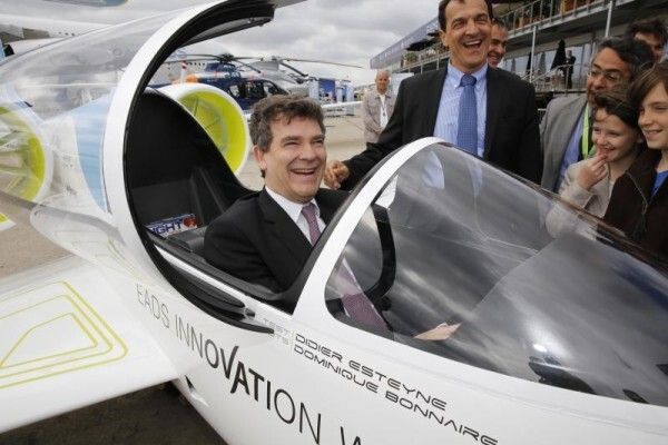 EADS at Paris Air Show Le Bourget 2013. Arnaud Montebourg French Minister of Industrial Renewal visits the EADS exhibition at Le Bourget. Left: Arnaud Montebourg, French Minister of Industrial Renewal; Right: Jean Botti, CTO of EADS (Airbus Group)