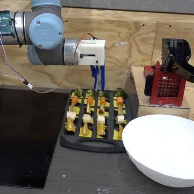 Researchers have trained a robotic ‘chef’ to watch and learn from cooking videos, and recreate the dish itself. The researchers, from the University of Cambridge, programmed their robotic chef with a ‘cookbook’ of eight simple salad recipes. After watching a video of a human demonstrating one of the recipes, the robot was able to identify which recipe was being prepared and make it. Researchers have trained a robotic ‘chef’ to watch and learn from cooking videos, and recreate the dish itself. The researchers, from the University of Cambridge, programmed their robotic chef with a ‘cookbook’ of eight simple salad recipes. After watching a video of a human demonstrating one of the recipes, the robot was able to identify which recipe was being prepared and make it.