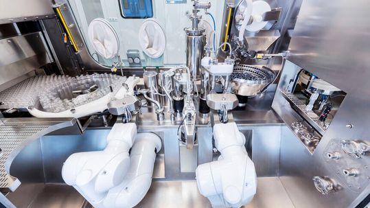 Machine robotisée de remplissage de flacons Steriline Machine robotisée de remplissage de flacons Steriline