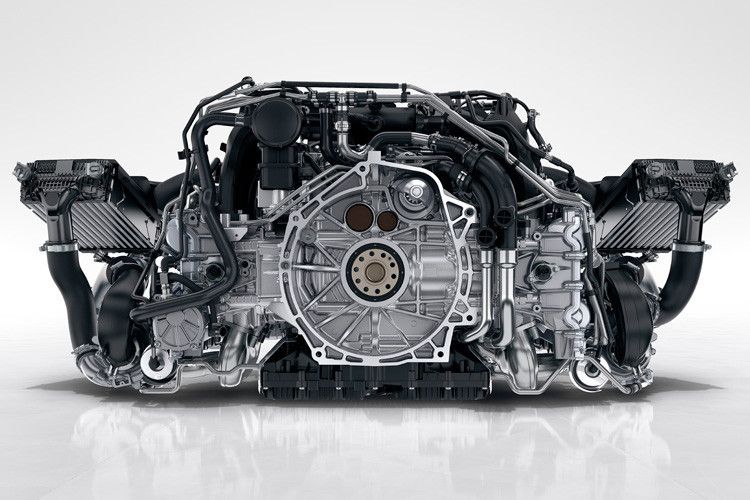 Die Carrera-Modelle haben jetzt einen Turbolader, der Sechszylinder-Boxer ist aufgeladen. (Foto: Porsche)