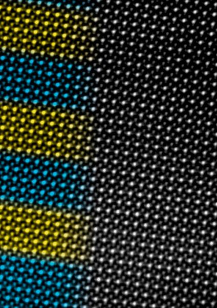 A scanning transmission electron microscopy image of a superlattice consisting of an alternating sequence of 5 atomic unit cells of neodymium nickelate (blue) and 5 atomic unit cells of samarium nickelate (yellow).  (Bernard Mundet / EPFL)