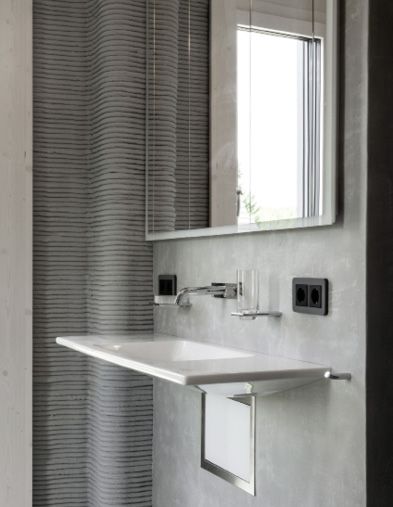 (Geberit-ONE-Waschtisch: Der Siphon verschwindet in einer Funktionsbox in der Vorwand. Bild: Geberit)