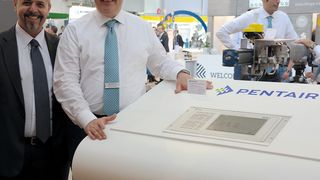 Pentair's Mario Pasquino (left) and Ugo Baldereschi (right) discuss the DCM2 remote actuator control system. (Picture: Page Bailey)