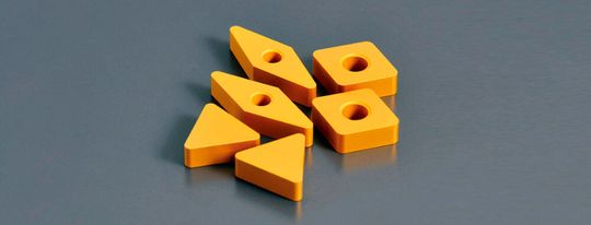 SP9 is a coated silicon nitride grade supporting roughing to finishing of gray and ductile cast iron.(Source:  NKT)