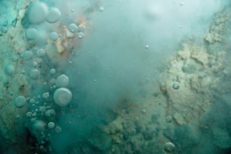 Bubbles of liquid carbon dioxide float out of the seafloor at a vent on Northwest Eifuku volcano off the coast of Japan. (Bob Embley, NOAA Office of Ocean Exploration)
