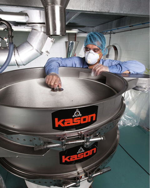 A Kason vibratory screener with circular 80 mesh (178 µm, 0.0070 in.) screen is inspected between production batches of fragrance powders. (Picture: Kason/Phil Degginger)