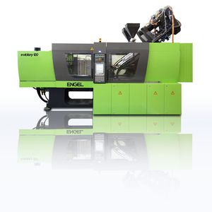 Zur Herstellung von Einlegern aus Faserverbundkunststoffen mit Endlosfaserverstärkung für Bremspedale ist die Spritzgießmaschine (Prototyp) mit zwei Dosiereinheiten zum reaktiven Thermoplastspritzießen ausgerüstet.