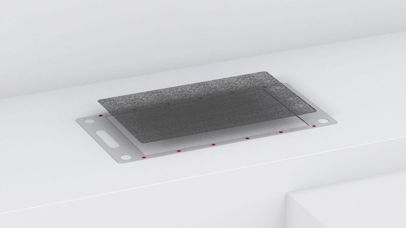 Fixierung einer Gas-Diffusionsschicht auf einem Rahmen, flüssiges Tape zur Illustration magenta eingefärbt.(Bild:  Delo)