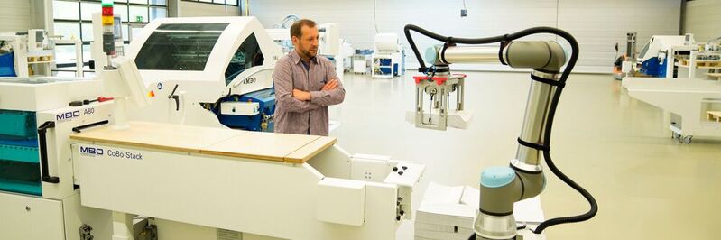 Der neue UR10e kommt in dem Cobo-Stack-Stapelroboter für Druckereien von MBO Postpress Solutions zum Einsatz, der jetzt auch schwerere Produkte transportiert.