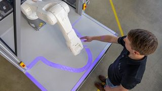Researchers from Fraunhofer IFF are making robots more deployable and safer for humans at the same time! The patented PARU safety technology, for instance, creates visible light curtains around the robot's workspace. If crossed, the robot reacts to prevent harm. (Image:Fraunhofer-IFF)
