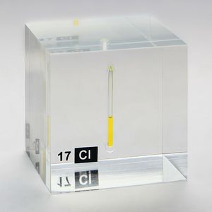 Chlorine, liquified under a pressure of 7.4 bar at room temperature. Chlorine is widely used for its great oxidising potential,, e.g. as a bleaching agent or disinfectant.