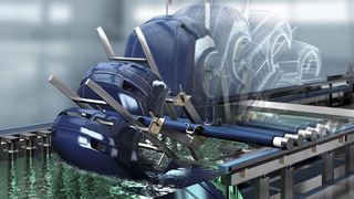 Karosserien von bis zu acht Metern Länge erhalten ihren Grundlackauftrag mit der Rotationstauchlackierung Ecopaint Rodip (Prinzipzeichnung). (Dürr)