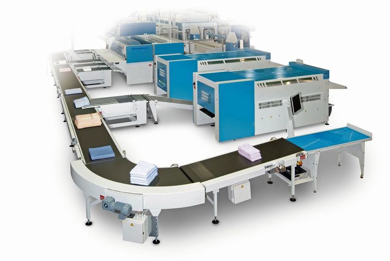 Die Sortiersysteme, Waschmaschinen, Wäschetrockner, Mangelautomaten oder Faltmaschinen werden in der Smart Laundry nicht als einzelne Maschinen betrachtet, sondern es wird im organisatorischen und datentechnischen Zusammenspiel der gesamte Prozess in der Wäscherei optimiert.  (Kannegiesser)