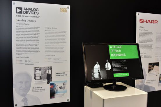 Analog Devices ist Meilensteine-Awardträger in der Kategorie Analogtechnik. Zu sehen ist der Infpoint mit der Gründergeschichte und dem Portrait von Firmengründer Ray Stata. In einem Timeline-Film konnten die Besucher die Historie des Analogtechnik-Pioniers nachverfolgen. (Fotostudio SX Heuser)