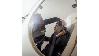 A simulated study participant uses a bod pod in the Longevity Lab. (Source: Shane Collins, Northwestern University)