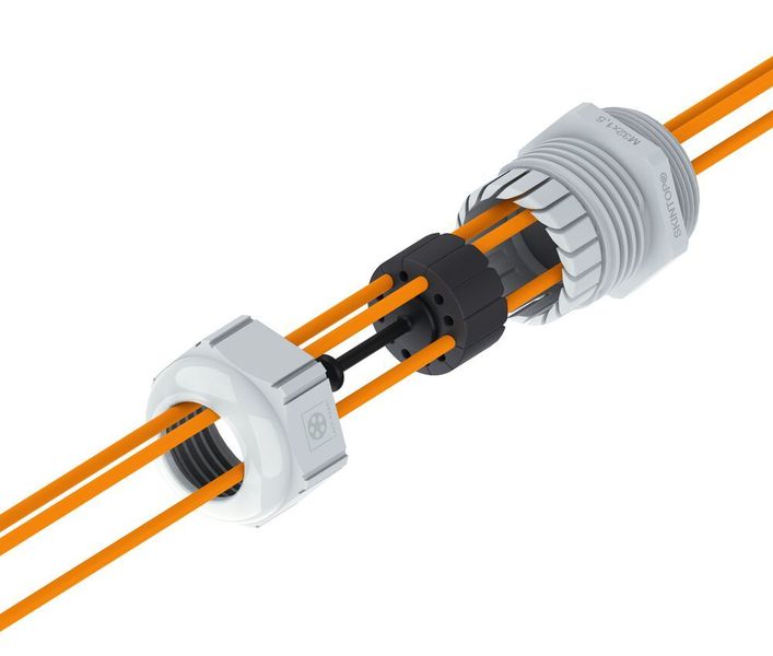 Lapp stellt auf der SPS unter anderem neue Skintop-Kabelverschraubungen vor. Dazu gehört die Skintop Fiber (Bild), die für Industrie-4.0-Anwendungen und FTTx-Netzarchitekturen konzipiert wurde. Eine schonende Klemmung fixiert und dichtet gut ab, soll aber die Übertragungsleistung nicht beeinflussen. Durch die geschlitzten Bohrungen im Dichteinsatz können konfektionierte Lichtwellenleiter durchgeführt werden. Außerdem neu: Die Dichteinsätze Skintop DIX-M Automation, die speziell zur Durchführung von bereits konfektionierten Datenleitungen geeignet sind. Und: Kabelverschraubungen in einer bleifreien Messingvariante.
 (Lapp)