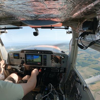 Ribbit engineers retrofitting a small aircraft with autonomous flight systems. Parasoft’s AI-driven testing platform ensures safety and compliance for future unmanned missions. (Source: Parasoft )