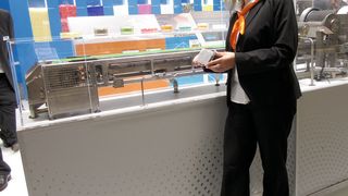 Sandvik's Gundula Eckhardt proudly shows the company's Rotoform 4G system running at the stand (Picture: Ondrey)