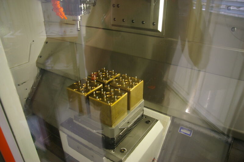 Une palette, munie de 4 posage, prête à être usinée sur la Mikron HSM 400. (Image: MSM / JR Gonthier)