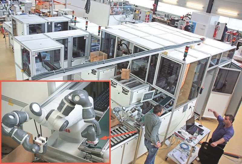 Die in Entstehung begriffene Fertigungslinie für Pumpen. Vorne links ein „mitarbeiterkompatibler“ zweiarmiger Handlingroboter, der keinen Sicherheitskäfig benötigt. (Klaus Vollrath)