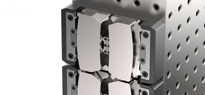 The finish machining operation on these ductile iron plates saw double the tool life and double the feed rate with Mill 16, the company says. (Kennametal)